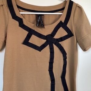 Next blouse with bow design in front